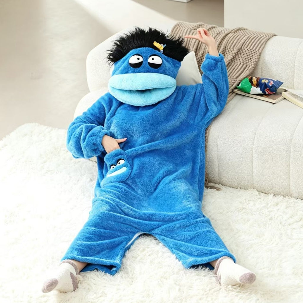 Lounging on the sofa in the Merry Muncher onesie