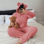 Front view with bear-ear hood up, cuddling a teddy